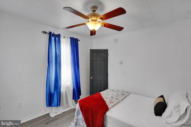 542 S 12th St, Reading, PA 19602 - bedroom with wood finished floors, ornamental molding, a ceiling fan, and baseboards