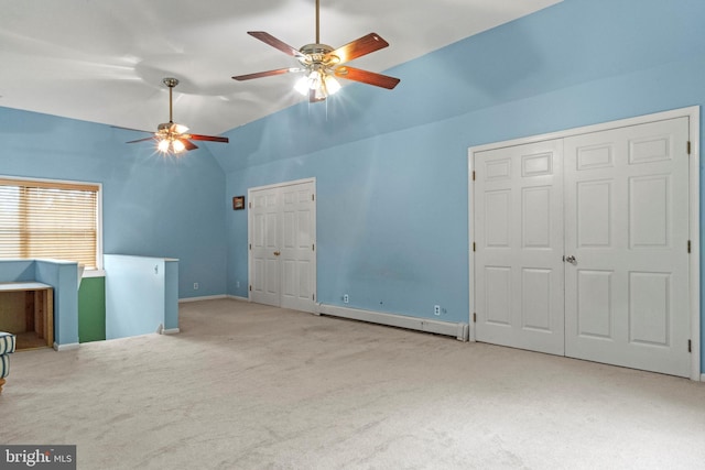 819 Elwood Rd, Hammonton, NJ 08037 - unfurnished bedroom with a baseboard heating unit, vaulted ceiling, carpet, baseboards, and a ceiling fan