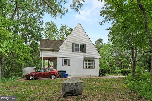 819 Elwood Rd, Hammonton, NJ 08037 - rear view of house featuring a shingled roof, a lawn, and stucco siding