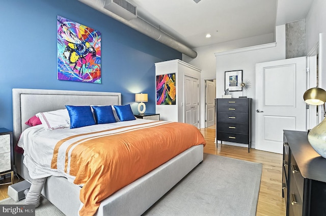 41 W Lemon St Unit 505, Lancaster, PA 17603 - bedroom featuring light wood-style flooring, a closet, and recessed lighting