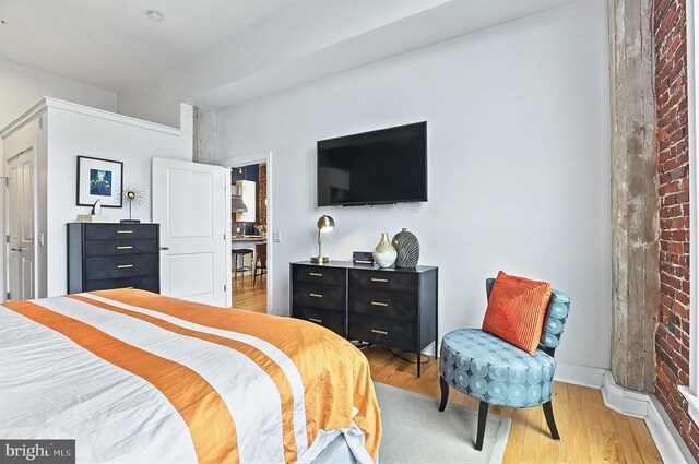 41 W Lemon St Unit 505, Lancaster, PA 17603 - bedroom with light wood-style floors and baseboards