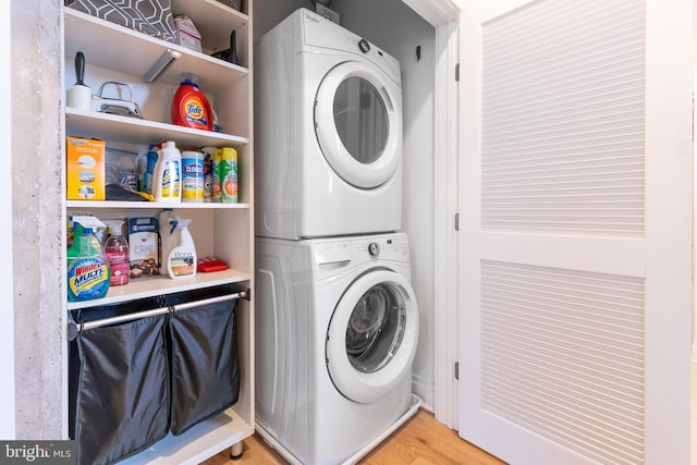41 W Lemon St Unit 505, Lancaster, PA 17603 - washroom with estacked washer and dryer and light wood-style floors