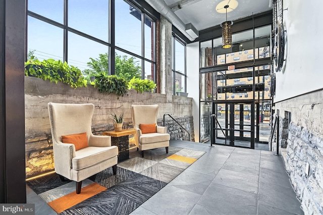 41 W Lemon St Unit 505, Lancaster, PA 17603 - building lobby featuring a high ceiling and floor to ceiling windows