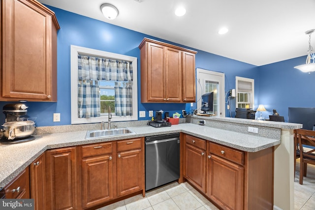 139 Flora Vista Ln, Woodstock, VA 22664 - kitchen featuring dishwasher, a sink, a peninsula, brown cabinets, and light tile patterned floors