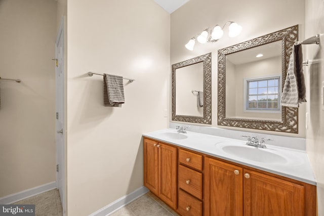 139 Flora Vista Ln, Woodstock, VA 22664 - bathroom with double vanity, tile patterned floors, and baseboards