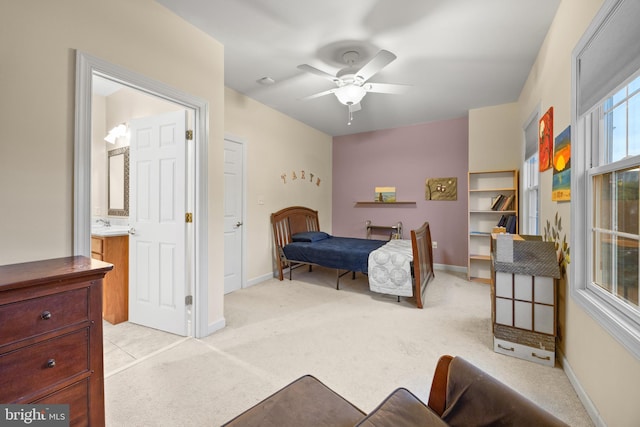 139 Flora Vista Ln, Woodstock, VA 22664 - bedroom with light colored carpet, baseboards, and a ceiling fan