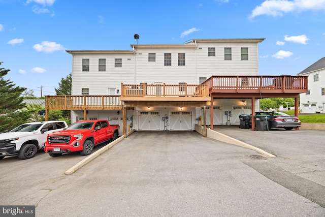 139 Flora Vista Ln, Woodstock, VA 22664 - rear view of property with a garage and a wooden deck