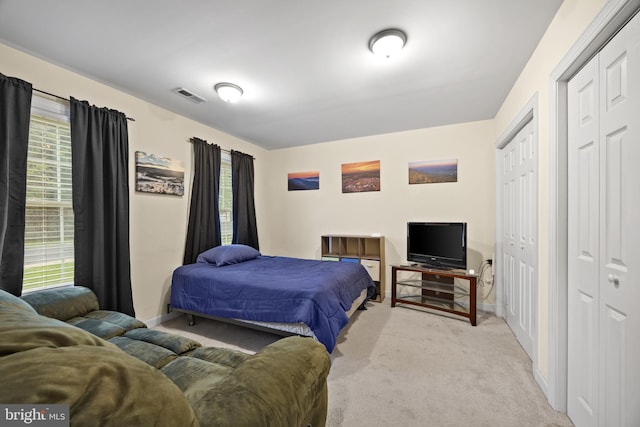 139 Flora Vista Ln, Woodstock, VA 22664 - carpeted bedroom featuring baseboards and two closets