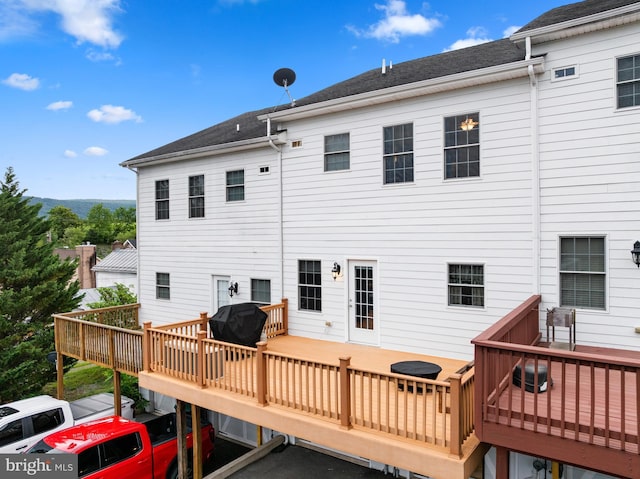 139 Flora Vista Ln, Woodstock, VA 22664 - back of house with a wooden deck and a shingled roof
