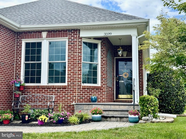 3599 Sutherland Ct, Warrenton, VA 20187 - view of exterior entry with brick siding and roof with shingles