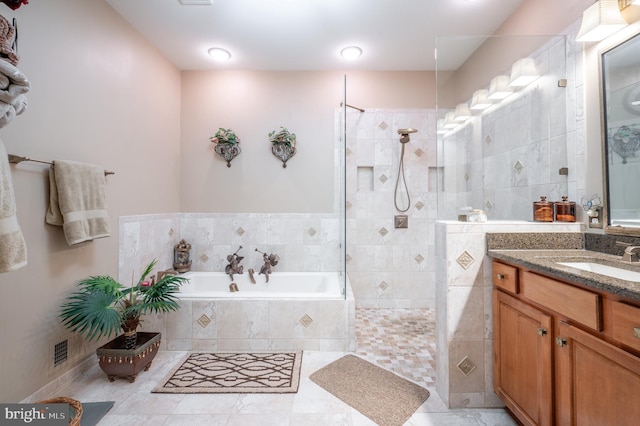 3599 Sutherland Ct, Warrenton, VA 20187 - full bath featuring vanity, a garden tub, walk in shower, and tile patterned flooring