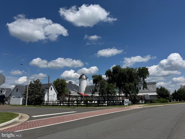 3599 Sutherland Ct, Warrenton, VA 20187 - view of asphalt road with curbs and street lighting