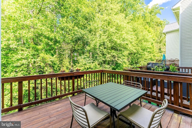 1251 Wild Hawthorn Way, Reston, VA 20194 - wooden terrace featuring outdoor dining area