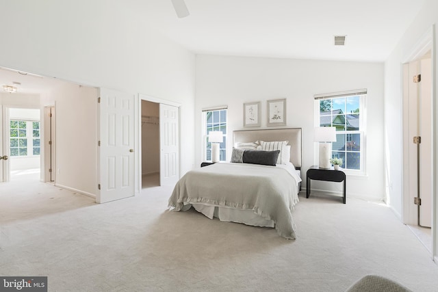 1251 Wild Hawthorn Way, Reston, VA 20194 - carpeted bedroom with multiple windows, high vaulted ceiling, a ceiling fan, and baseboards