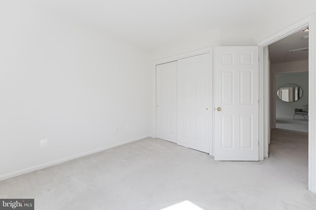 1251 Wild Hawthorn Way, Reston, VA 20194 - unfurnished bedroom with light colored carpet, a closet, attic access, and baseboards