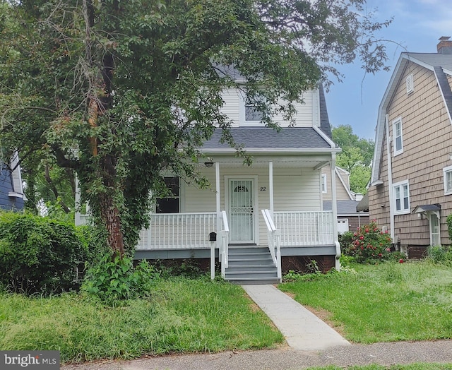 22 Leeway Rd, Baltimore, MD 21222 - view of front of home with covered porch and a shingled roof