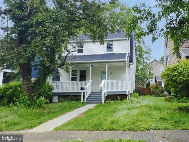 22 Leeway Rd, Baltimore, MD 21222 - view of front of house featuring a porch, a chimney, and central air condition unit