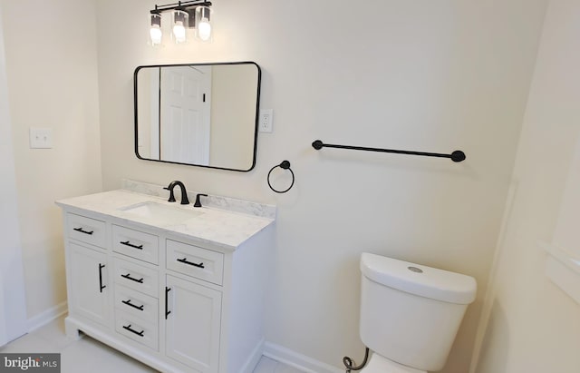 22 Leeway Rd, Baltimore, MD 21222 - bathroom with vanity, toilet, and baseboards