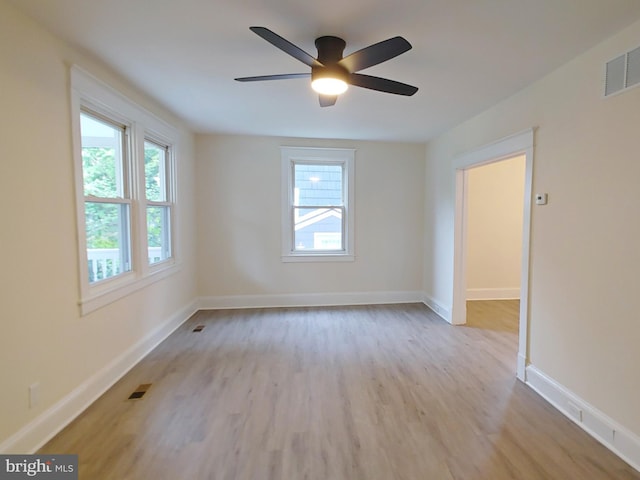 22 Leeway Rd, Baltimore, MD 21222 - unfurnished room featuring wood finished floors, a ceiling fan, and baseboards