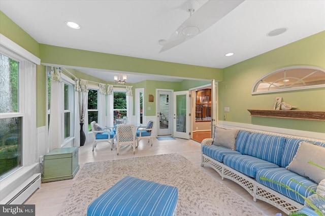 12695 Kettering Dr, Herndon, VA 20171 - sunroom / solarium featuring a baseboard heating unit and a chandelier