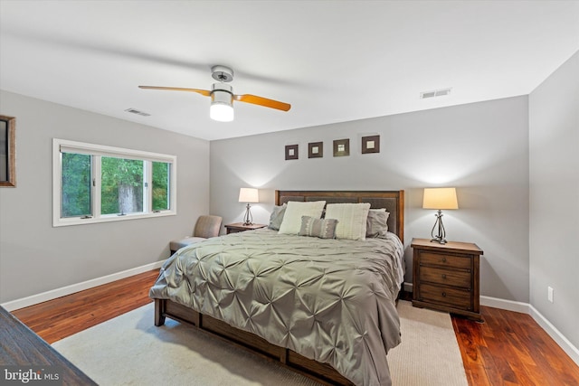 12695 Kettering Dr, Herndon, VA 20171 - bedroom with wood finished floors, baseboards, and ceiling fan