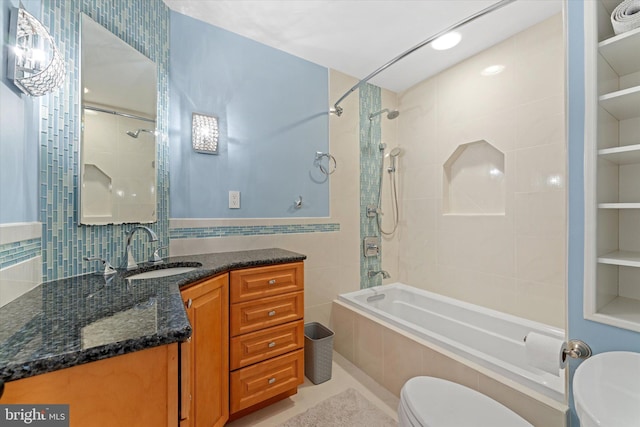 12695 Kettering Dr, Herndon, VA 20171 - full bath featuring tiled shower / bath combo, toilet, and vanity