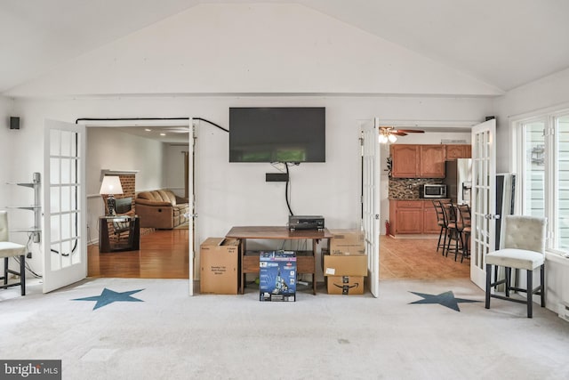 102 Gardengate Rd, Camden Wyoming, DE 19934 - living room with french doors, light colored carpet, a ceiling fan, and high vaulted ceiling