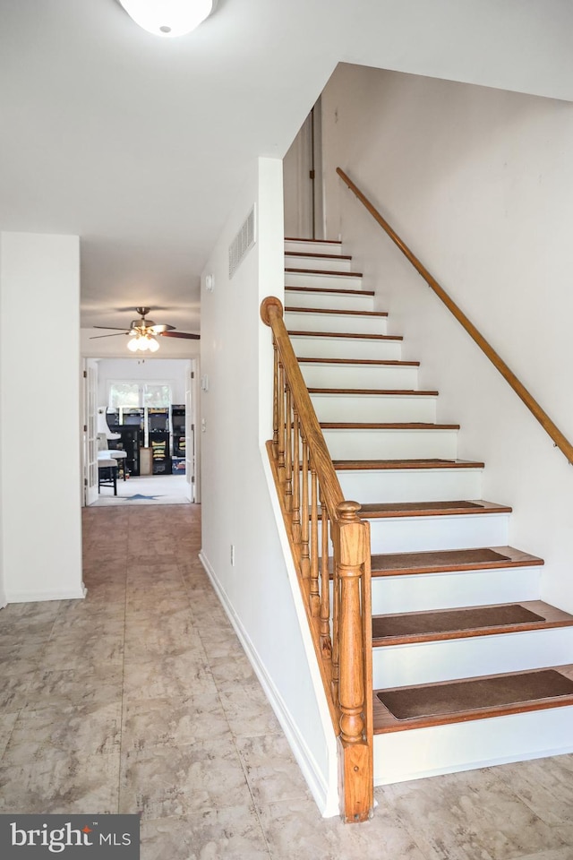102 Gardengate Rd, Camden Wyoming, DE 19934 - staircase featuring ceiling fan and baseboards