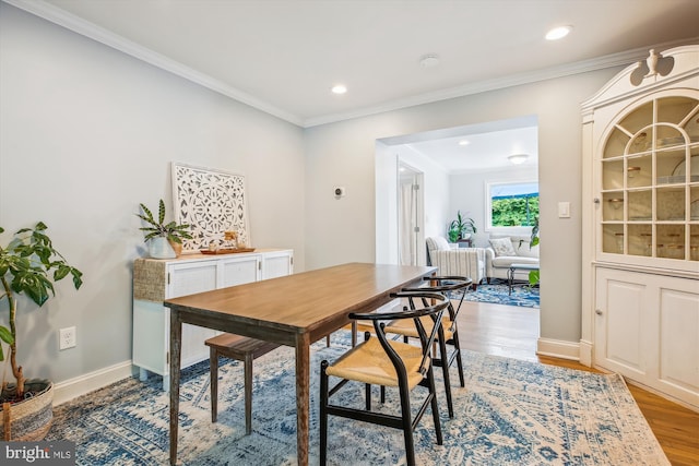 2709 Emmet Rd, Silver Spring, MD 20902 - dining space featuring light wood-type flooring, recessed lighting, ornamental molding, and baseboards