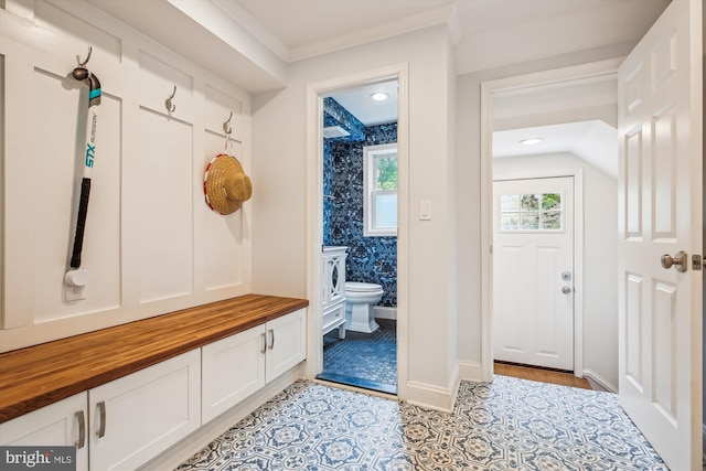 2709 Emmet Rd, Silver Spring, MD 20902 - mudroom featuring crown molding and light tile patterned floors