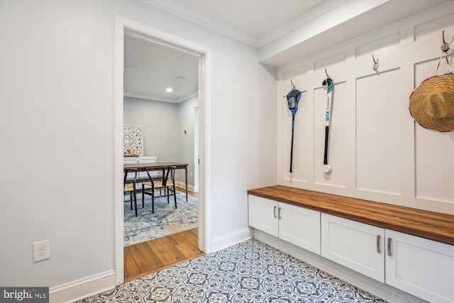 2709 Emmet Rd, Silver Spring, MD 20902 - mudroom featuring ornamental molding, baseboards, light tile patterned floors, and recessed lighting