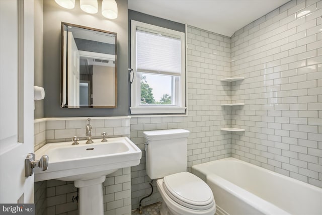 2709 Emmet Rd, Silver Spring, MD 20902 - bathroom with toilet, tile walls, and  shower combination