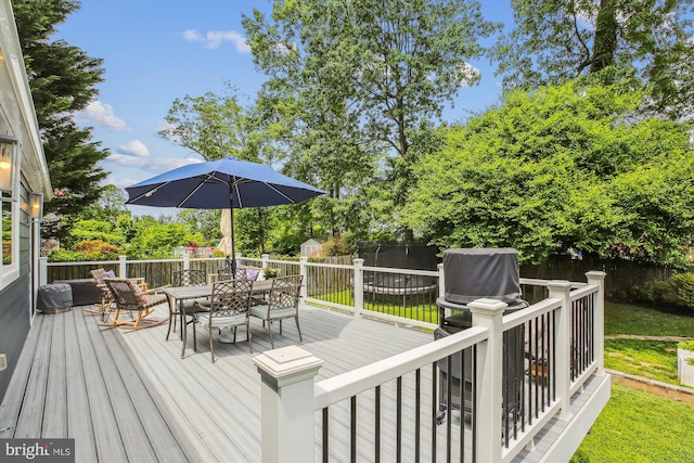 2709 Emmet Rd, Silver Spring, MD 20902 - deck with outdoor dining space and a fenced backyard