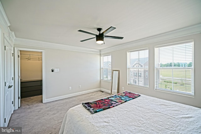 35290 Wright Way, Millsboro, DE 19966 - bedroom with crown molding, light carpet, a walk in closet, baseboards, and ceiling fan