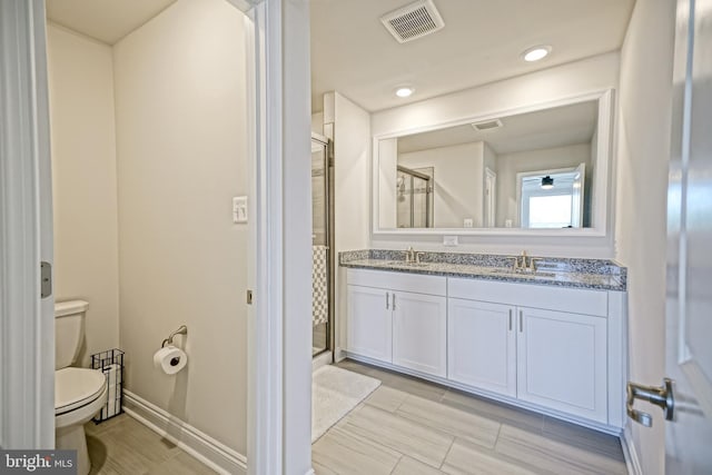 35290 Wright Way, Millsboro, DE 19966 - bathroom featuring toilet, a shower stall, and double vanity