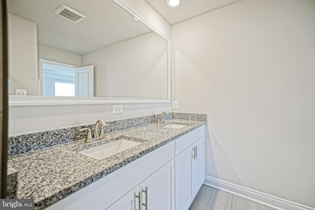 35290 Wright Way, Millsboro, DE 19966 - bathroom with double vanity and baseboards