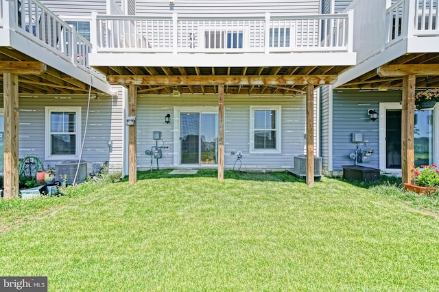 35290 Wright Way, Millsboro, DE 19966 - property entrance with central AC unit, a deck, and a lawn