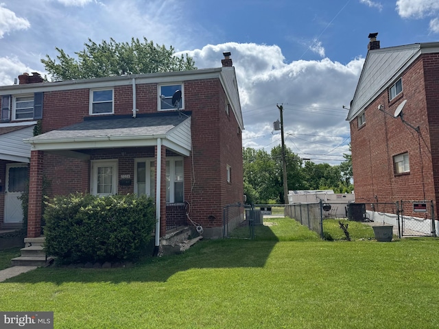 8024 Kimberly Rd, Dundalk, MD 21222 - view of front of property featuring a chimney, brick siding, and central AC