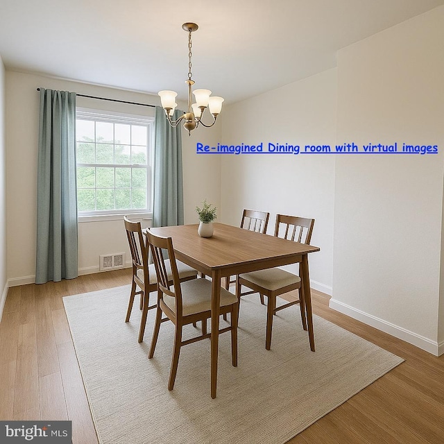 8024 Kimberly Rd, Dundalk, MD 21222 - dining room featuring a chandelier, light wood-style floors, and baseboards
