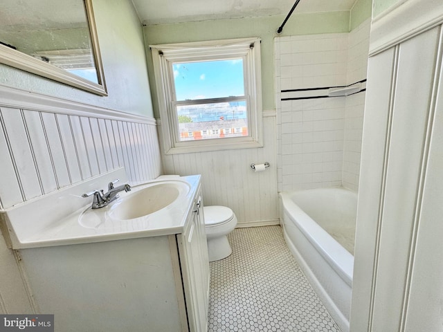 8024 Kimberly Rd, Dundalk, MD 21222 - full bath with toilet, vanity, a wainscoted wall, and shower / bath combination