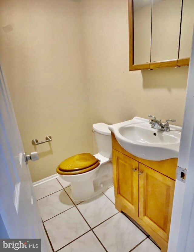 230 W Federal St, Burlington, NJ 08016 - bathroom with vanity, toilet, and tile patterned floors