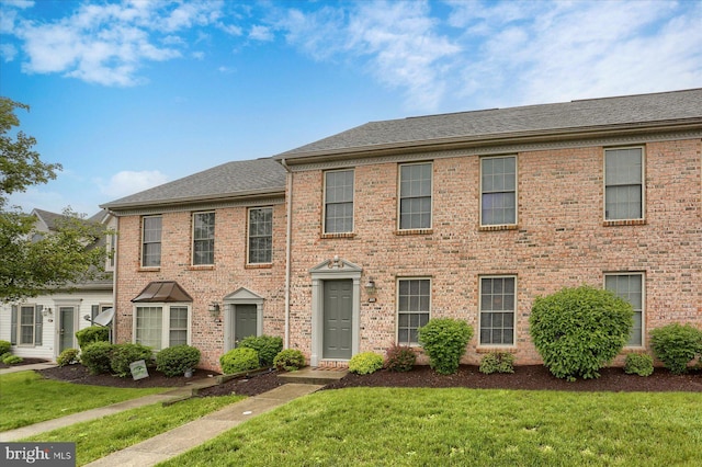 205 Saddle Ridge Dr, Harrisburg, PA 17110 - view of front facade featuring a front yard, brick siding, and a shingled roof
