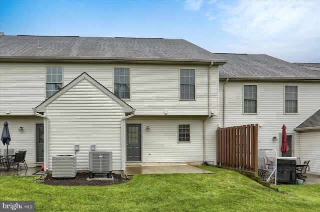 205 Saddle Ridge Dr, Harrisburg, PA 17110 - rear view of house with cooling unit, a patio, and a lawn