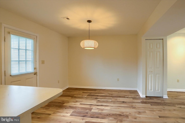 205 Saddle Ridge Dr, Harrisburg, PA 17110 - unfurnished dining area with light wood finished floors and baseboards