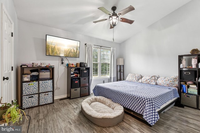 71 Sudbury Sq, Sterling, VA 20164 - bedroom with wood finished floors, vaulted ceiling, baseboards, and ceiling fan