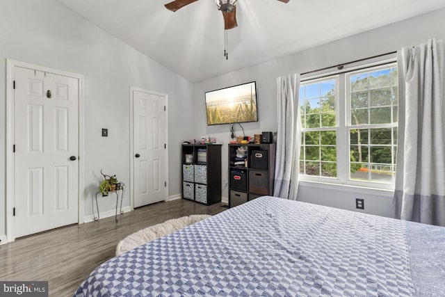 71 Sudbury Sq, Sterling, VA 20164 - bedroom with wood finished floors, lofted ceiling, baseboards, and ceiling fan