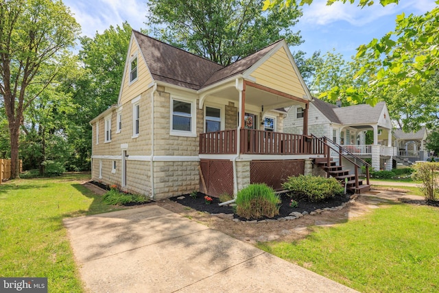 3023 Chesley, Baltimore, MD 21234 - view of front of house featuring roof with shingles, covered porch, and a front lawn