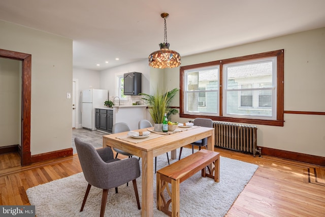 3023 Chesley, Baltimore, MD 21234 - dining space with radiator, baseboards, light wood-style floors, and recessed lighting