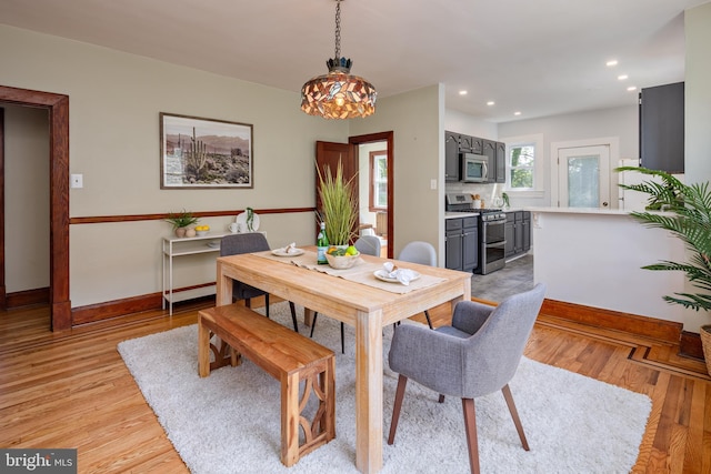 3023 Chesley, Baltimore, MD 21234 - dining room featuring baseboards, recessed lighting, light wood-style flooring, a chandelier, and a baseboard heating unit