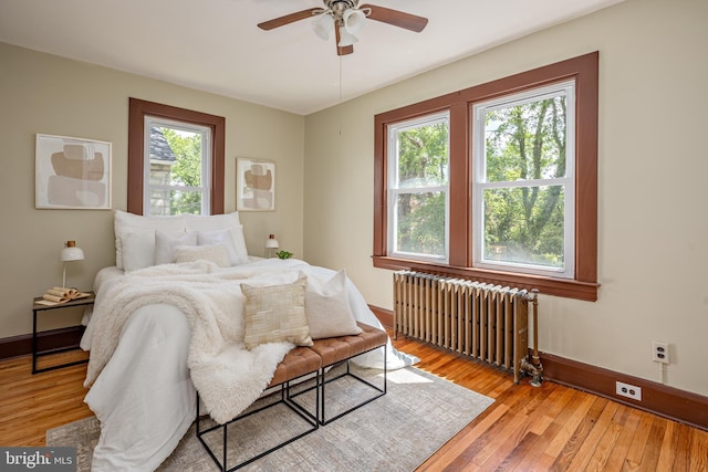 3023 Chesley, Baltimore, MD 21234 - bedroom with radiator, baseboards, light wood-style flooring, and ceiling fan